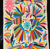 Camino bordado a mano