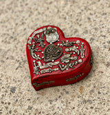 Corazón milagritos Botero