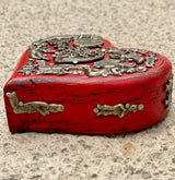 Corazón milagritos Botero