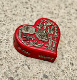 Corazón milagritos Botero